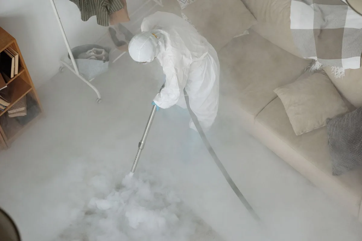 Biohazard cleanup technician in protective equipment, Wheelersburg, OH